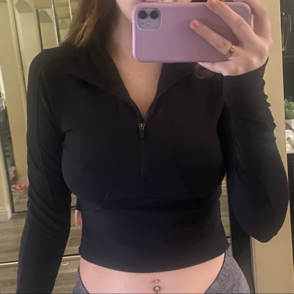 Black Lululemon cropped align half zip jacket. Size 4. Perfect condition.